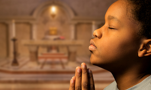 A young DC boy practicing his Catholic Faith at Annunciation Catholic School