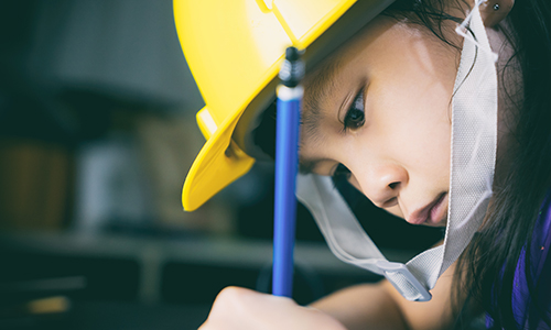 young girl working in the engineering program at Annunciation Catholic School