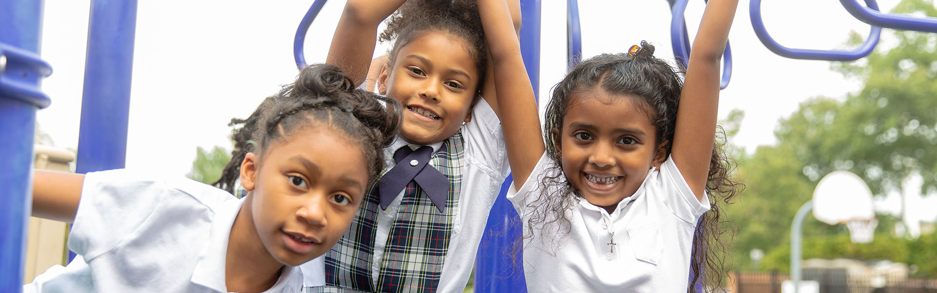girl students on playground at annunciation catholic school in washington, dc